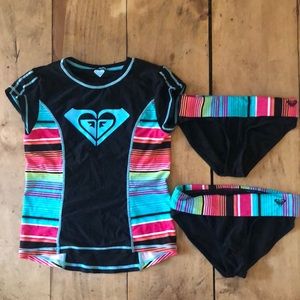 Like new- Cute Girls Roxy Swim suit/rash guard size 10 with 2 bikini bottoms